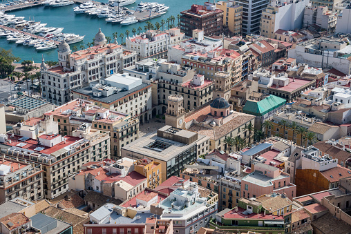 Community of Valencia, Spain - April 20, 2018: Aerial view of the city and port of the city of Alicante, from the castle of Santa Barbara