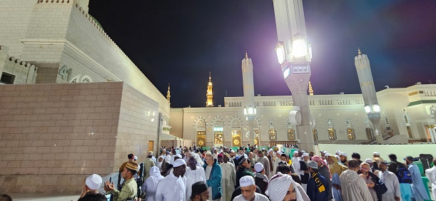 Madinah, Saudi Arabia – December 20, 2023: Evening at Al Masjid an Nabawi mosque complex. a pilgrimage site with the tomb of the prophet Muhammad.