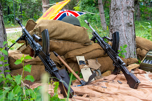 two, WW2, British, Bren, machine guns, sandbags, forest, British flag, event, military