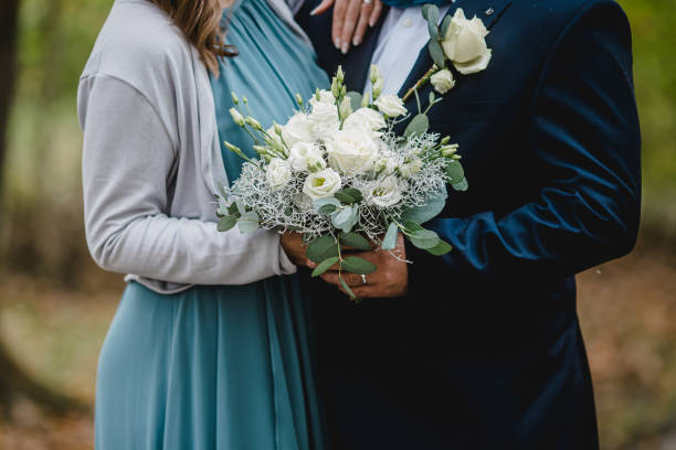 istock wedding flowers bride bouquet groom 1987984892