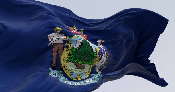 istock Maine state flag waving on a clear day 1988008364