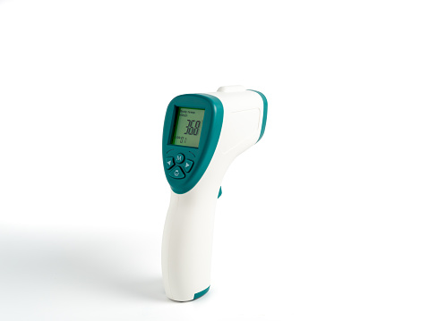 Non-contact electronic thermometer for measuring body temperature. Electronic thermometer close-up.