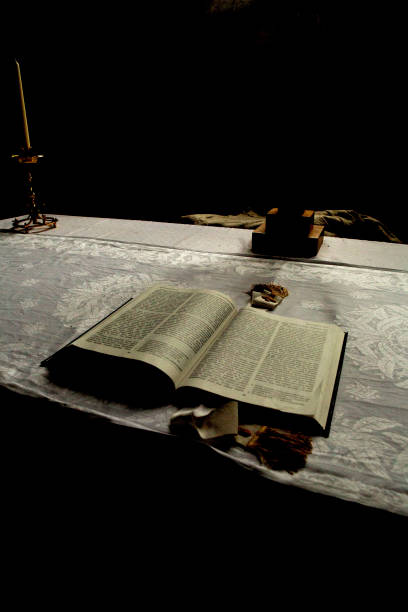 A Bible lies open on the altar of the Parish Church of the Lost Village of Imber.  The vilage was evacuated in 1943 so that Allied troops could use the area to train for D Day and the residents have never retaurned - today, it lies in the middle of a vast military training are used by British and NATO forces. But the village is occasionally opened by the British Ministry Of Defence and civilians can visit by arrangement when no training is under way.  Being in the Churhc (where services are also occasionally still conducted) is a haunting experience.
