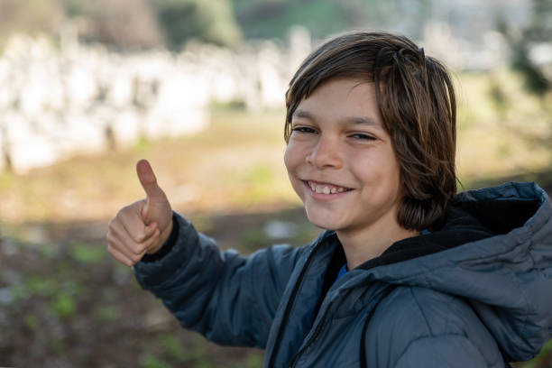Portrait of little boy looking at camera