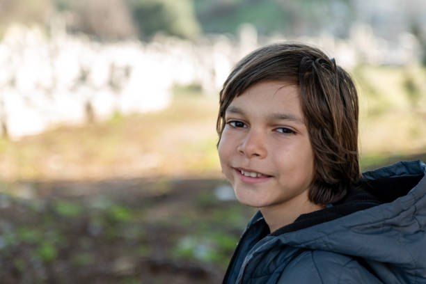 Portrait of little boy looking at camera