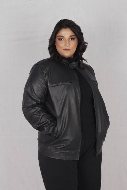 istock Female model in black jacket leather 1988054093
