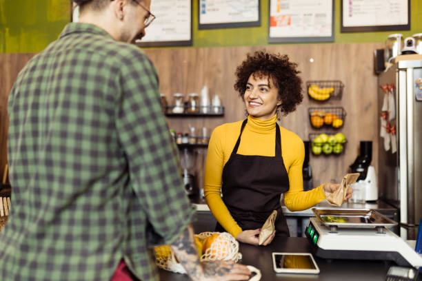 istock Man shopping grocery in the small store 1988057737