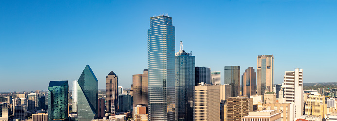 Dallas downtown skyline at near sunset / the golden hour, aerial view.