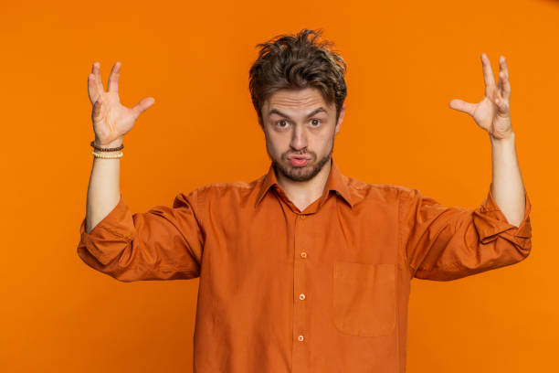 istock Excited amazed Caucasian man touching head showing explosion celebrating success, good idea, answer 1988077825