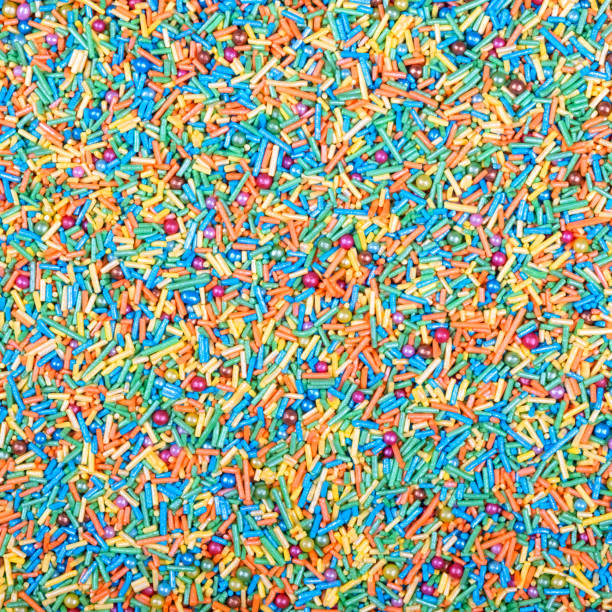 istock Colorful and bright cake decorations, in powder and granule form. 1988090436