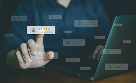 Customer review good rating concept, hand Pressing user and five star icon on visual screen for positive customer feedback, testimonial and testimony, user comment and feedback for review.