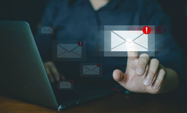 istock Alert warning and notification email concept, company sending many e-mails or digital newsletter to customers. 1988099090