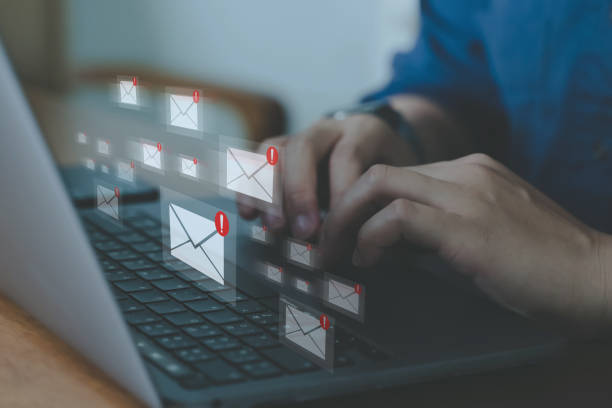 istock Alert warning and notification email concept, company sending many e-mails or digital newsletter to customers. 1988099603