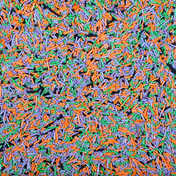istock Colorful and bright cake decorations, in powder and granule form. 1988104334