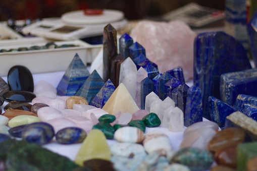 Exhibition of rare precious stones and minerals on a table