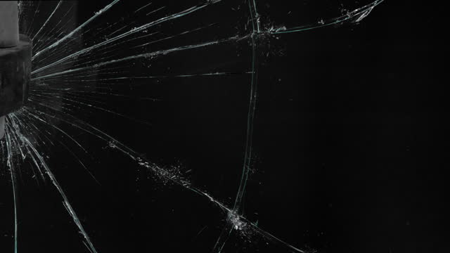 Super Slow Motion Shot of Breaking Real Glass