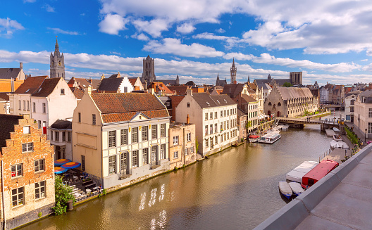 Aerial view of quay Graslei, Leie river and towers of Old Town, Ghent, Belgium