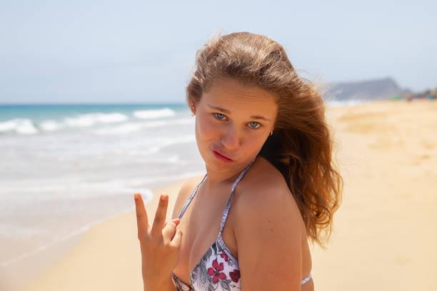 Blond teenage girl at the beach