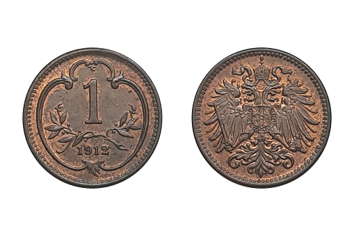 1 heller 1912. Coin of Austrian Empire. Obverse The double headed imperial eagle with Habsburg-Lorraine shield on breast.  Reverse Value above sprays, date below, within curved stylised shield
