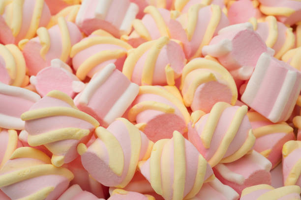 Delicious plump pink and white marshmallows, close-up.