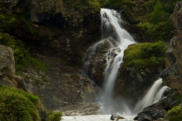 istock Mountain waterfall in the Italian Alps, Valle d'Aosta 1988182721