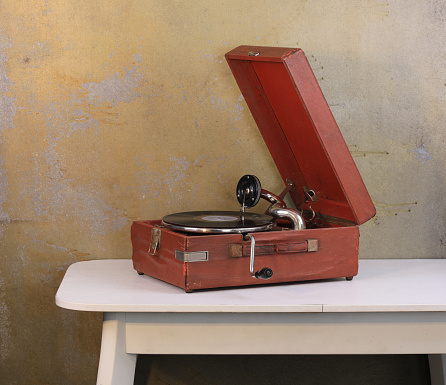 old room with a gramophone on the table
