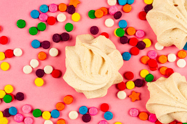 Delicate white-pink marshmallow . white plate with marshmallows on the table close-up