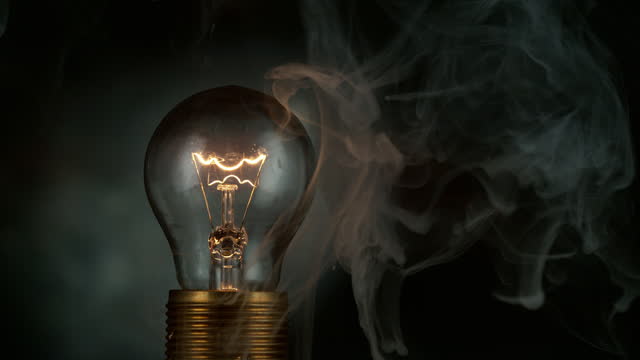 Super slow motion of light bulb exploding