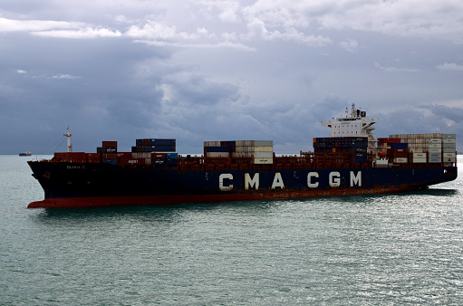 Livorno, Italy-November 01,2023:Container ship CMA CGM Olivia 1 near Livorno. Import, export and business logistic. International water transport.