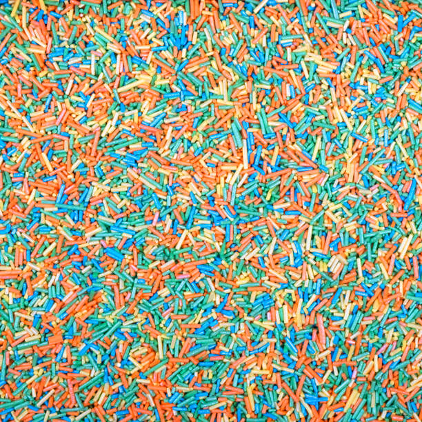 istock Colorful and bright cake decorations, in powder and granule form. 1988255603