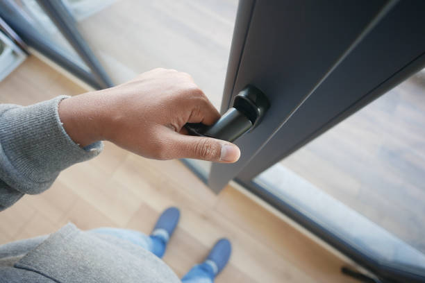 istock hand open gray plastic pvc window at home at early morning 1988272387