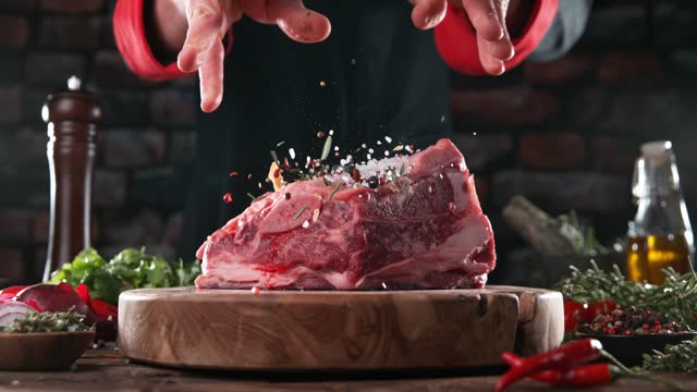 Raw beef steak on kitchen table