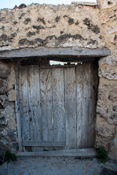 istock Old wooden gates to enter corrals 1988291952