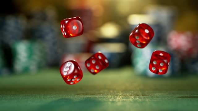 Super slow motion of falling game dices