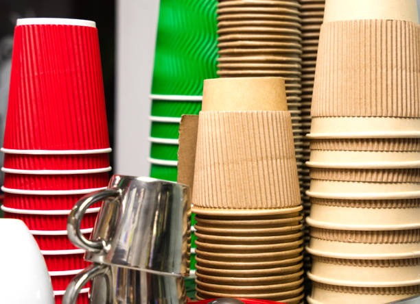 istock A stack of disposable paper cups and cupc in a cafe. Coffee to go. Close-up. Selective focus. 1988304118