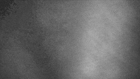 Gray grainy background with shades. Gray background with shades wallpaper for computer desktops.