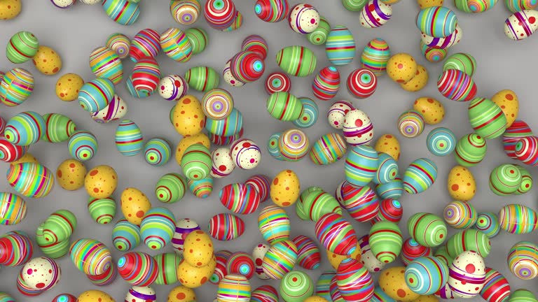 Colorful Easter eggs pour down, filling the screen with a festive pattern, then drop out of view, ideal for Easter-themed backdrops.