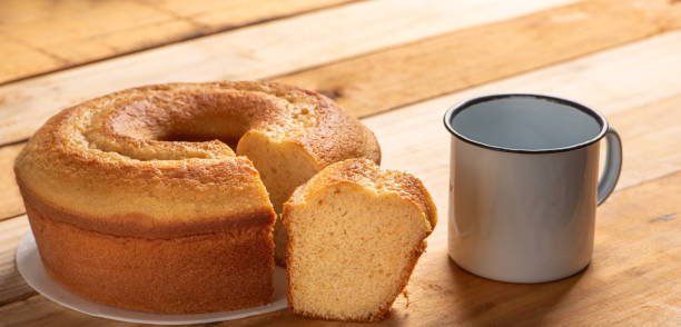 istock Orange cake, beautiful orange cake and accessories on rustic wood, selective focus. 1988450084