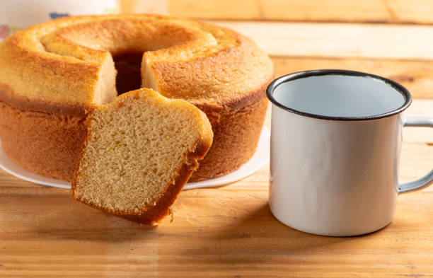 istock Orange cake, beautiful orange cake and accessories on rustic wood, selective focus. 1988450640