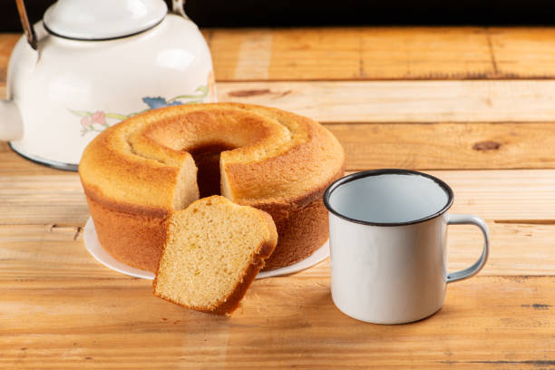 istock Orange cake, beautiful orange cake and accessories on rustic wood, selective focus. 1988451160