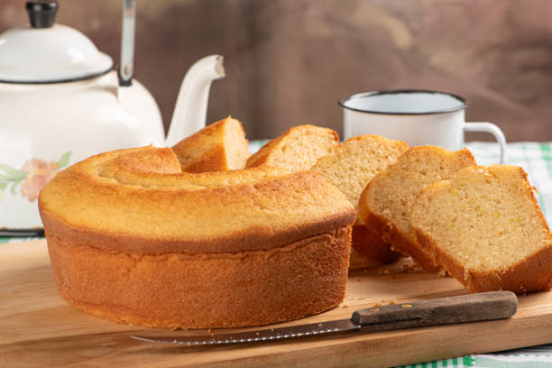 istock Orange cake, beautiful orange cake and accessories on rustic wood, selective focus. 1988451692