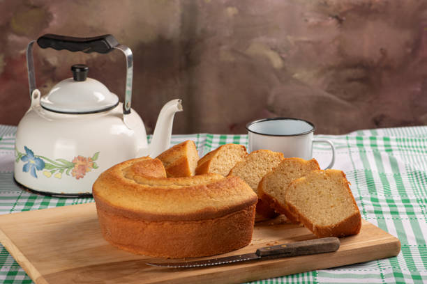 istock Orange cake, beautiful orange cake and accessories on rustic wood, selective focus. 1988451699
