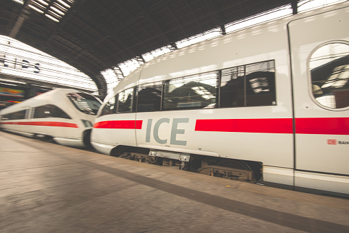Hamburg, Germany - July 30 2016: Ice express train passing a station.