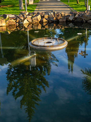 non-working fountain in the park. Round font under repair. A nice place. Resort in winter