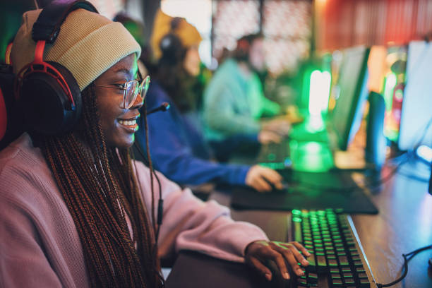 istock Friends in gaming club 1988564631
