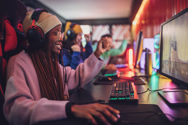 istock Friends in gaming club 1988565139