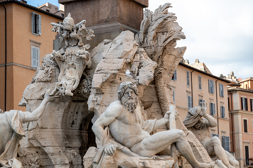 Roma, Latium - Italy - 11-24-2022: Detailed sculptures of Fontana dei Quattro Fiumi, a masterpiece in Piazza Navona