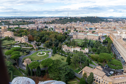 Roma, Latium - Italy - 11-26-2022: Overlooking the lush Vatican Gardens, this view captures the expansive urban landscape of Rome