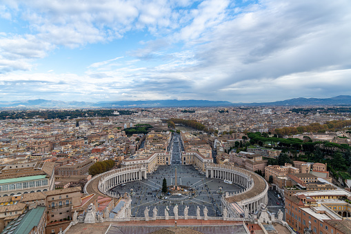 Roma, Latium - Italy - 11-26-2022: Expansive view over St. Peter's Square and beyond from Vatican's heights, showcasing Rome's landscape