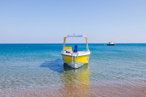 Yellow catamaran in caribbean sea, Cancun, Mexico. Long banner